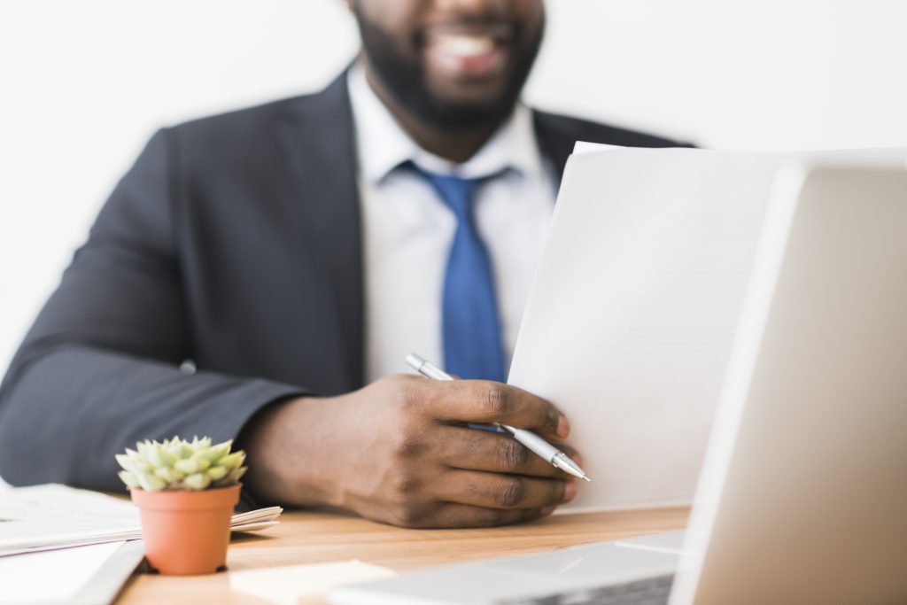 Employee preparing documents at a desk