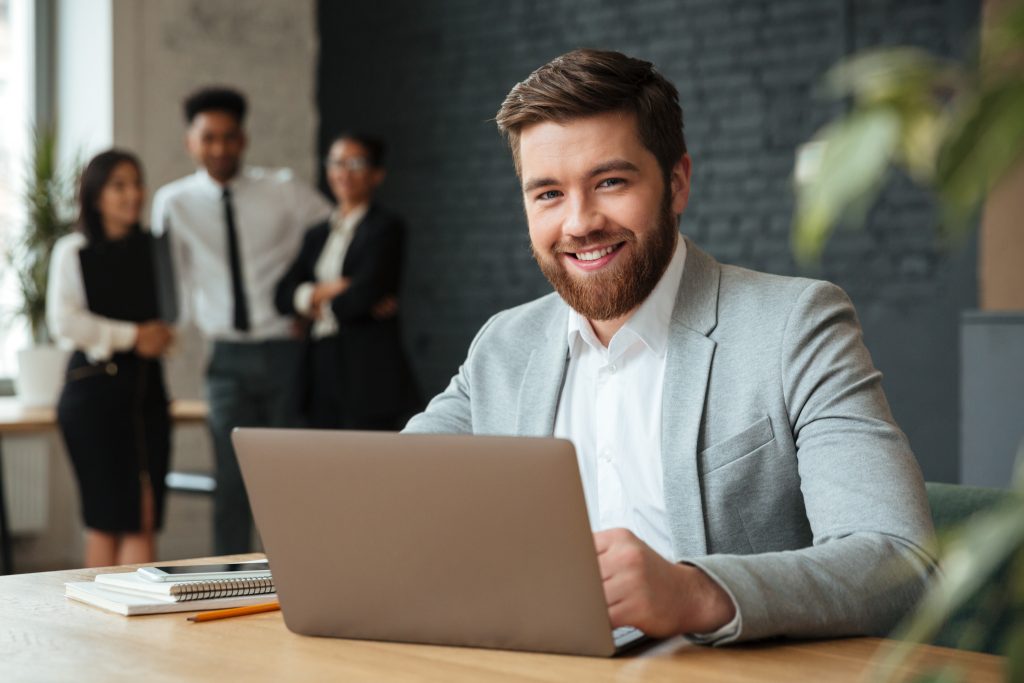 Entrepreneur working on a laptop in a shared office