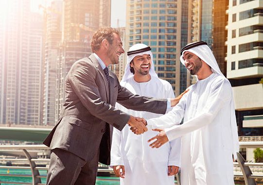 Businessmen struck a deal in Dubai. Shot from Istockalypse Dubai 2015.