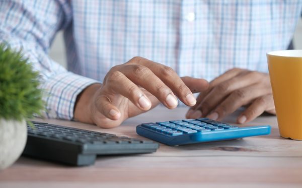 Calculating figures at a desk